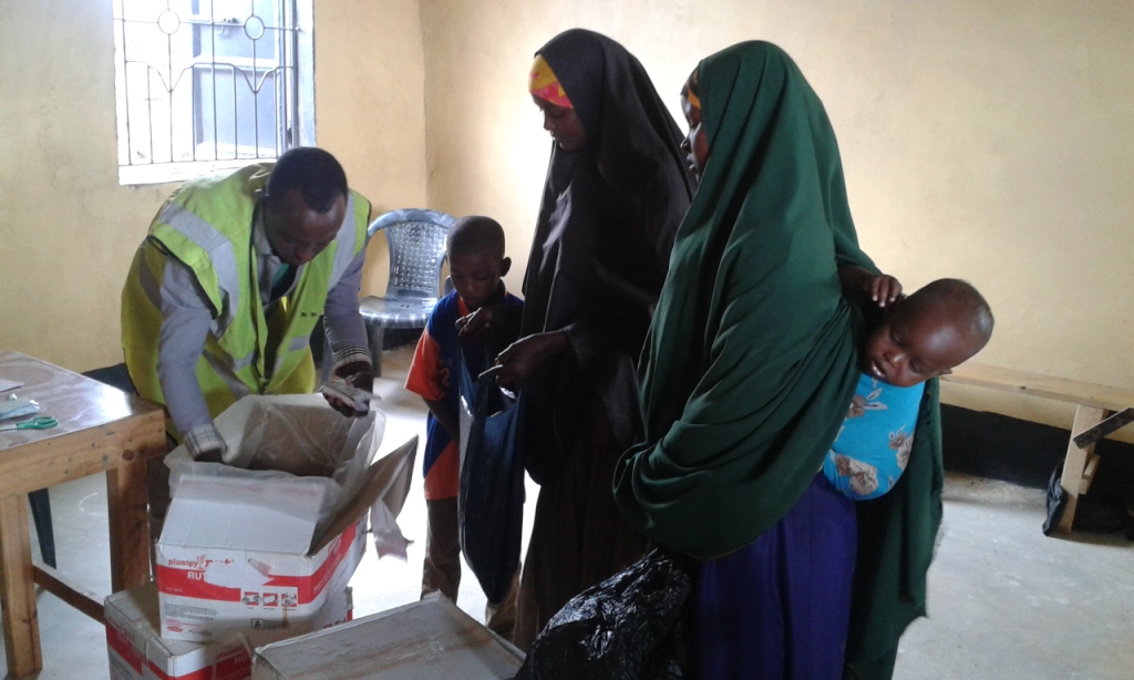 School staff supporting children in a classroom.